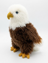 A handmade alpaca fur bald eagle stuffed animal, 12 inches, with a white head, brown body and glass eyes