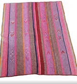 Archival Textile No. 104: A vintage Peruvian Frazada featuring a complex vertical stripe arrangement in saturated pink berry, violet, and orange. This hand-loomed wool textile shows a signature central union seam and traditional scalloped edges, isolated on a gallery-white background.