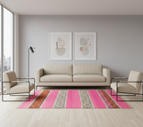 Archival Textile No. 111: A vintage Peruvian Frazada rug with fuchsia and charcoal stripes and a rare scalloped crochet edge. This one-of-a-kind hand-loomed wool rug is a museum-quality piece from the Maras region